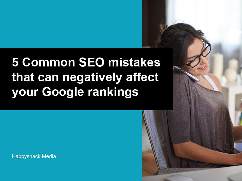 Woman at a desk working on SEO mistakes on her small business website